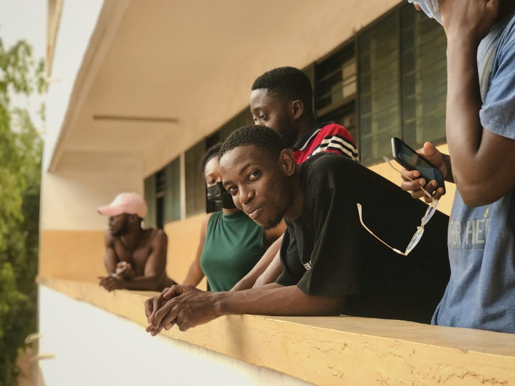 African university students collaborating on a laptop